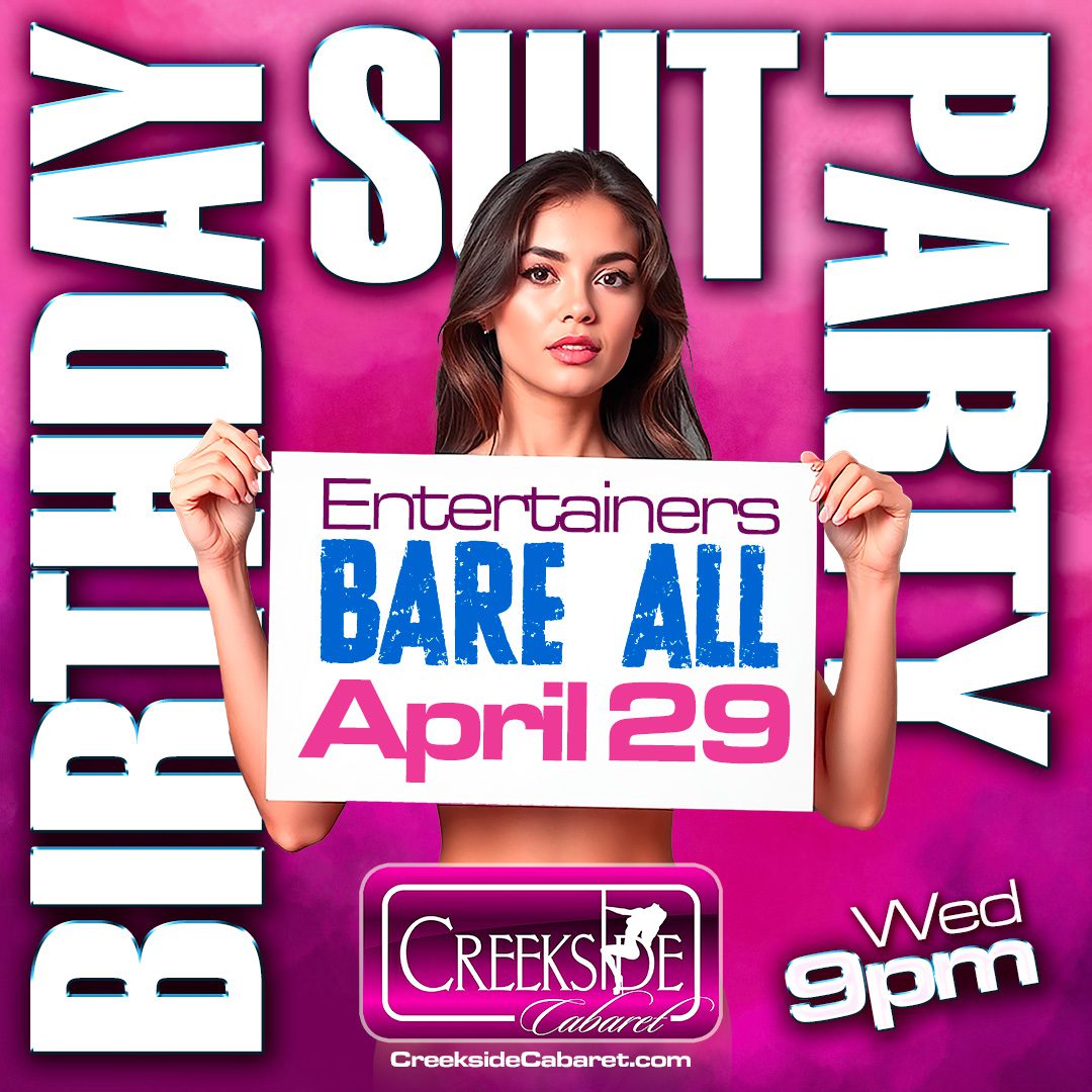 Woman holding "Bare All" sign for party